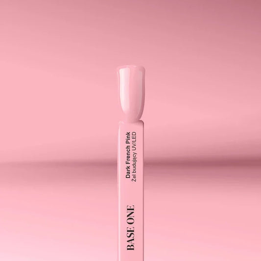 The 15g jar of Base One Dark French Pink UV gel, featuring a dense, rosy hue perfect for creating natural-looking French manicure beds.