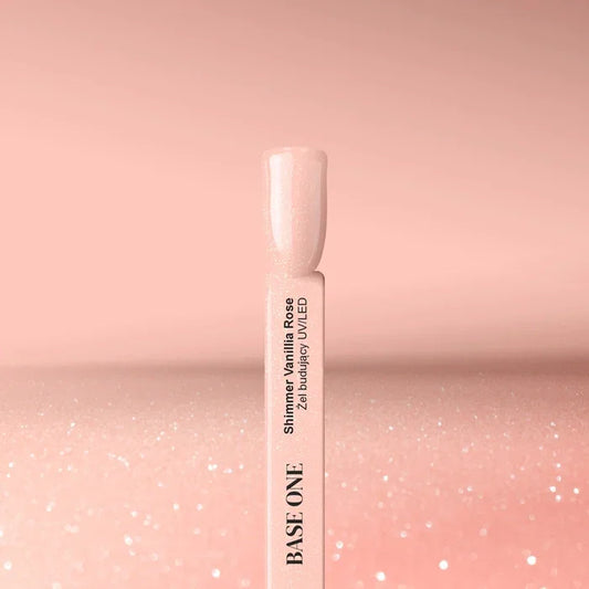 Cured nail tip displaying the shimmery, soft Vanillia Rose color of the Base One UV builder gel (15g), perfect for a sparkling natural base.