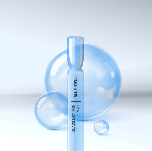 Semi-transparent blue glass effect gel top coat no wipe with glossy nail sample and high shine finish by Silcare