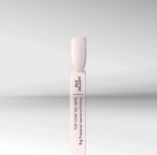 Silcare Silk Delight milky no wipe top coat nail swatch semi transparent gel top coat for baby boomer and French ombre nails.