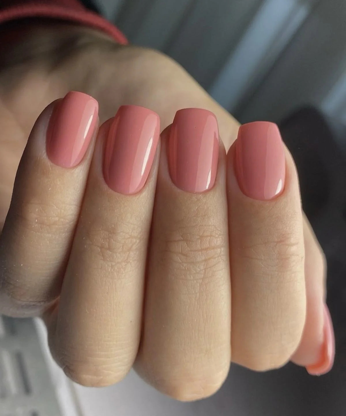 Smooth, full coverage manicure in the opaque Nothing Special shade (warm terracotta pink), achieved using Base One Builder Gel in a Bottle.