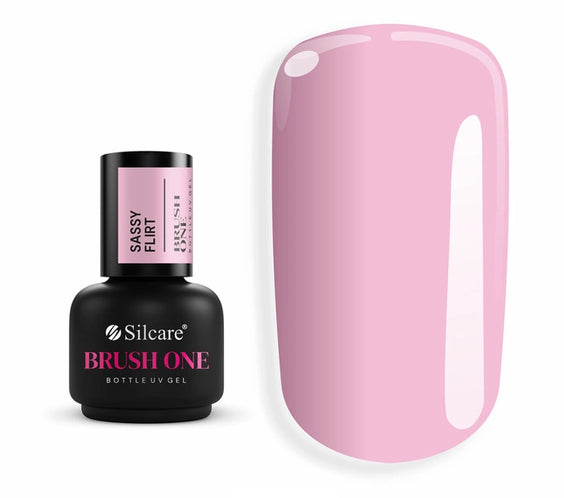 Brush One Bottle Gel (15g) in Sassy Flirt, set next to a nail tip, displaying the opaque, sweet, light pink color sample.
