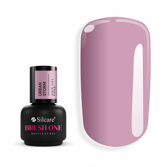 Brush One Bottle Gel (15g) in Urban Storm, set next to a large nail tip, displaying the opaque, dark dusty pink color with violet undertones.