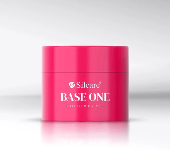 Close-up view of the 15g jar containing Silcare Base One Violet UV builder gel, highlighting the clear formula with a yellow-neutralizing violet tint.