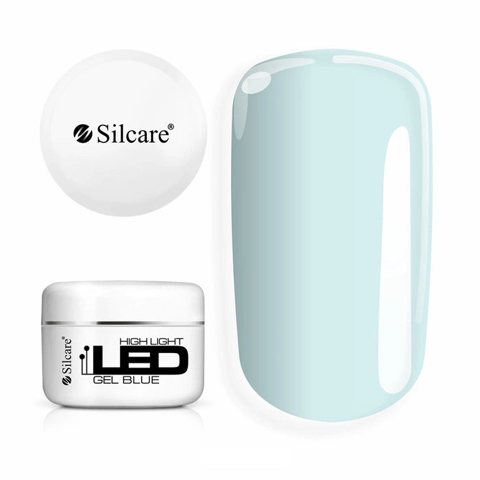 Jar of High Light LED Blue Builder Gel (100g), set next to a large nail tip, displaying the clear formula with a subtle blue tint to neutralize yellowing.