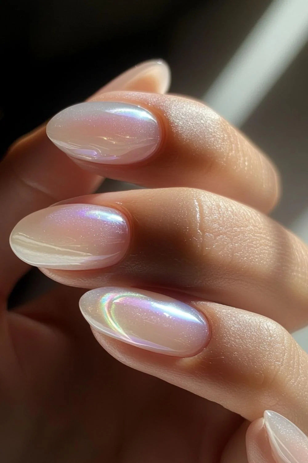 Nails finished with High Light LED Aura Milky Builder Gel (15g), displaying a smooth, milky white manicure with a beautiful pearl sheen and subtle sparkle.