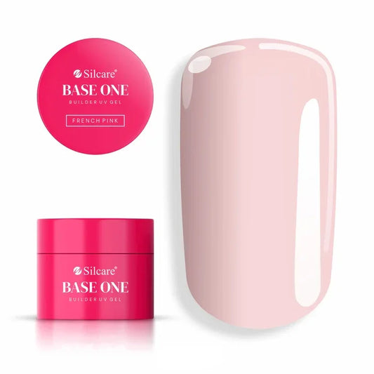 Jar of Silcare Base One French Pink UV builder gel (15g) displayed beside a nail tip, showing the classic, translucent pink shade ideal for natural French beds.
