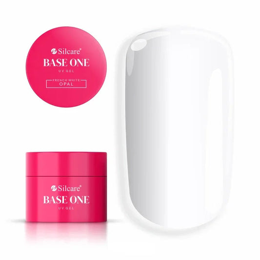 Jar of Silcare Base One French White Opal UV builder gel (15g) set next to a large nail tip, displaying the pure, opaque cold white color for striking French tips.