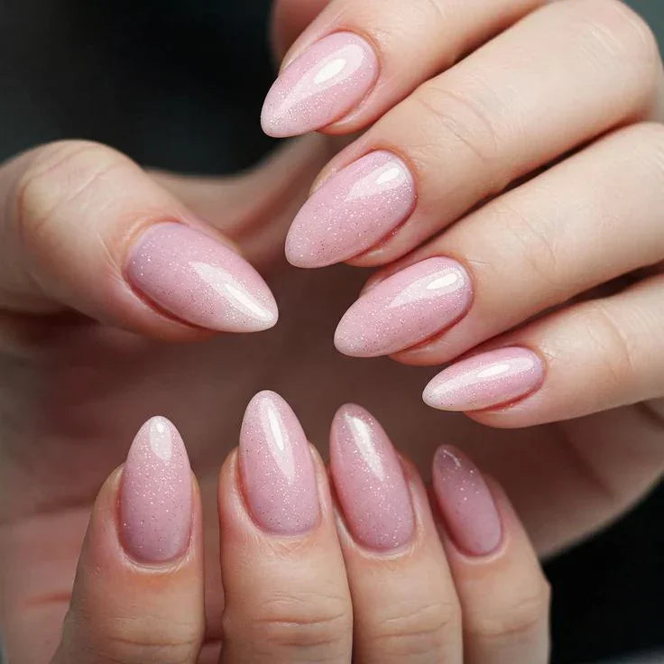 Nails finished with Base One Shimmer Misty Rose UV builder gel (15g), displaying a smooth, opaque dusty rose manicure with fine, light-reflecting shimmer.