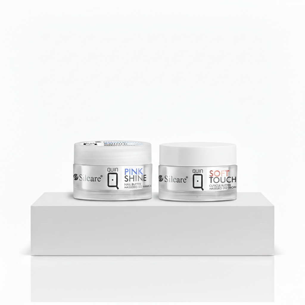 Two jars of Silcare Quin Nail Butter, Pink Shine and Soft Touch, displayed as a manicure bundle on a white podium. High-quality professional nail care and cuticle treatment products for salon-quality results.