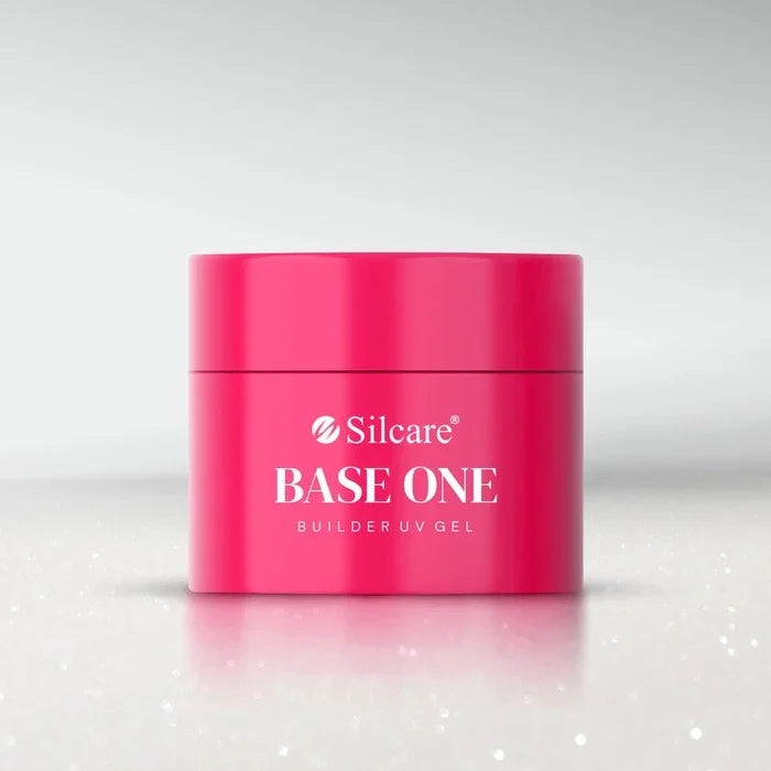Front view of the Silcare Base One Builder UV Gel pink container on a shimmering white background.