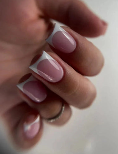 French manicure with dark pink builder gel base and white tips on natural nails – glossy salon-quality finish
