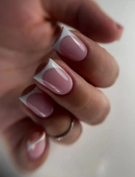 French manicure with dark pink builder gel base and white tips on natural nails – glossy salon-quality finish
