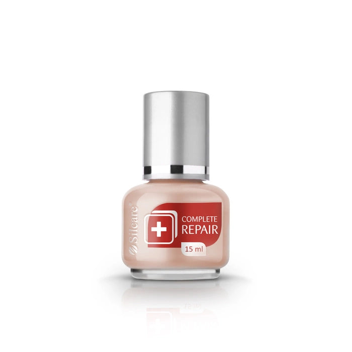 Professional nail strengthening treatment for damaged nails, Complete Repair 15ml bottle in nude pink.