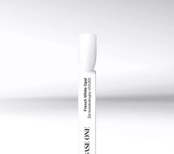 A white nail display tip showcasing Silcare Base One French White Opal UV/LED builder gel against a clean white background by Silcare.