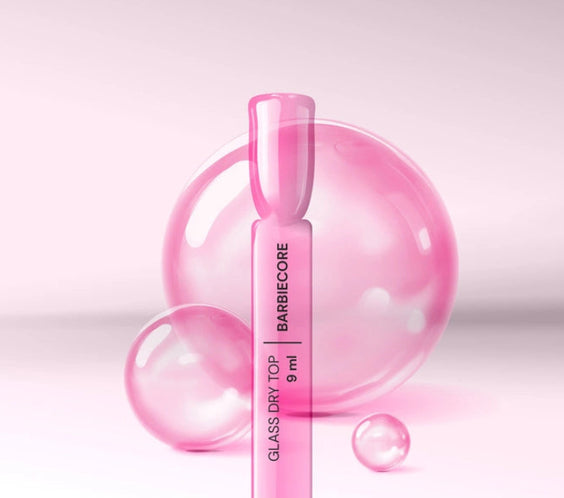 Semi-transparent pink glass effect nail tip with Silcare Glass Dry Top Barbiecore gel top coat