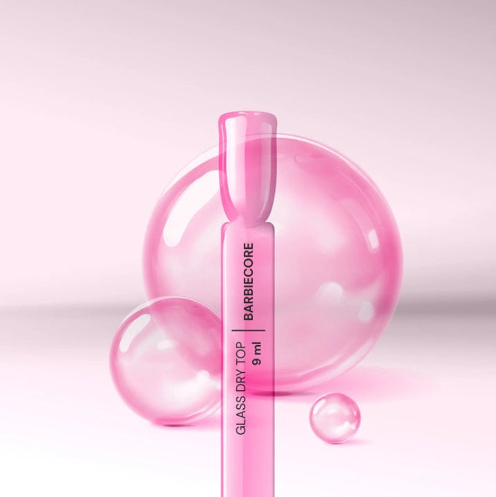Semi-transparent pink glass effect nail tip with Silcare Glass Dry Top Barbiecore gel top coat