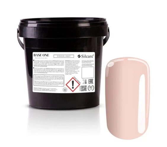 Silcare Base One Builder Gel Cover Light bulk salon bucket packaging with product label, shown next to a glossy nude beige nail swatch, highlighting smooth opaque coverage and natural nail tone on a clean light background.