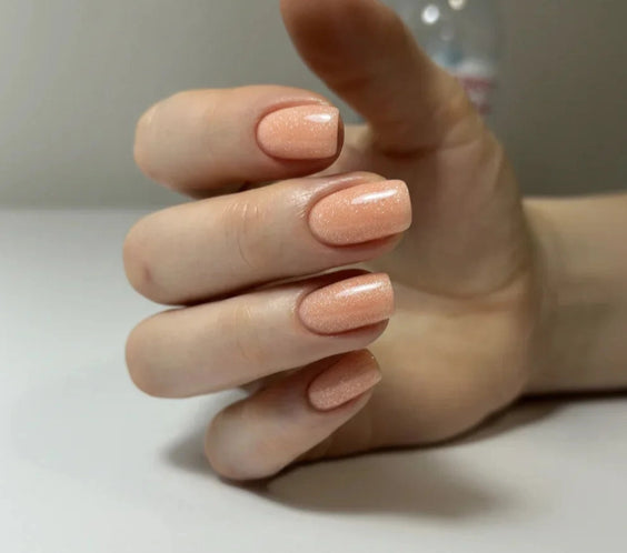 Silcare Base One Builder Gel Shimmer Blush Cream on short square nails, showcasing a soft blush pink manicure with delicate shimmer, glossy self-levelling UV LED builder gel finish, ideal for natural nail overlays, elegant nail extensions and long-lasting salon-quality manicures in Australia.