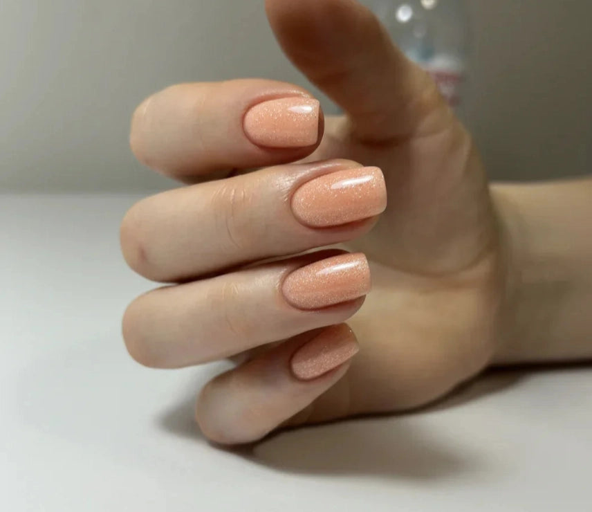 Silcare Base One Builder Gel Shimmer Blush Cream on short square nails, showcasing a soft blush pink manicure with delicate shimmer, glossy self-levelling UV LED builder gel finish, ideal for natural nail overlays, elegant nail extensions and long-lasting salon-quality manicures in Australia.