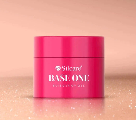 Silcare Base One Builder Gel Shimmer Blush Cream professional builder gel jar with a soft blush pink shimmer background, showcasing a self-levelling UV LED builder gel for natural nail overlays, durable extensions and salon-quality manicures in Australia.