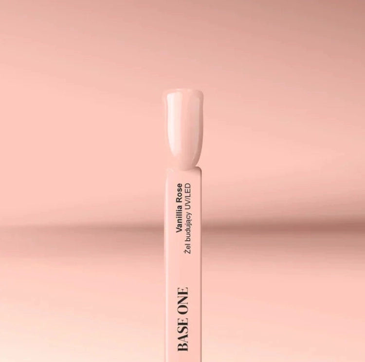 Silcare Base One Builder Gel Vanillia Rose colour swatch on display stick, showing soft warm nude pink shade with glossy smooth finish against a minimal pastel background, highlighting true gel colour and professional salon-quality texture.