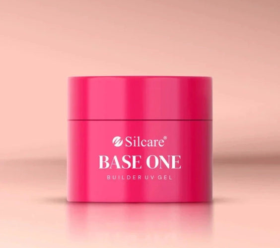 Silcare Base One Builder Gel Vanillia Rose in bright pink jar packaging on a soft pastel background, showcasing professional UV builder gel product with sleek design, ideal for natural nude pink manicures and salon-quality nail enhancements.