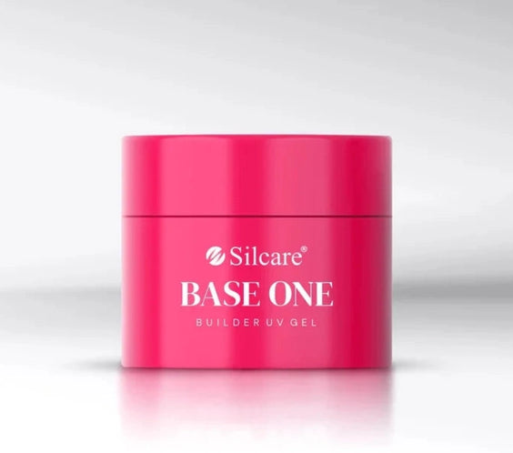 Silcare Base One builder UV gel pink container with branded label, professional self-levelling nail builder gel jar for salon use isolated on light background