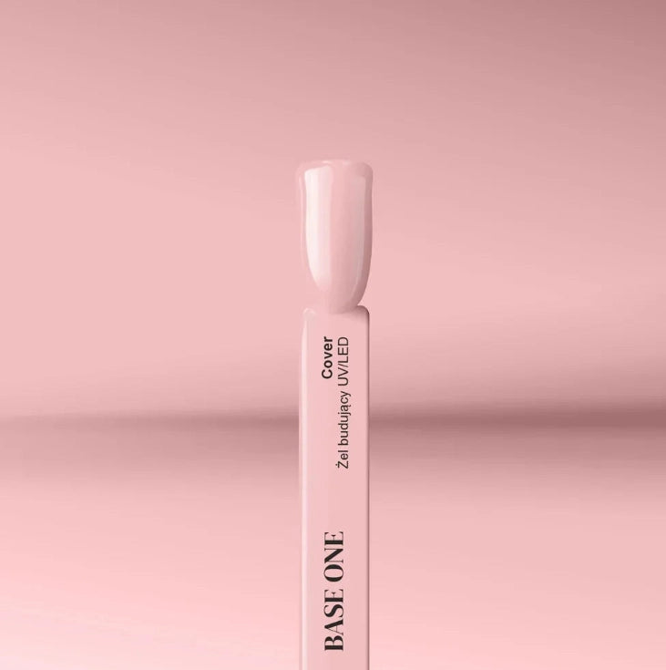 Silcare Base One Cover builder UV LED gel swatch stick with nude beige nail tip on pink background, showing smooth glossy coverage and natural tone finish
