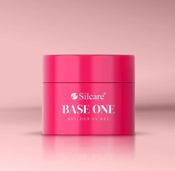 Silcare Base One Cover builder UV gel in bright pink jar with logo on front, professional nail builder gel container on soft pink background