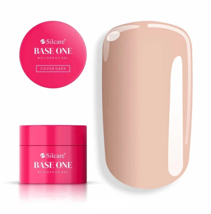 Silcare Base One Cover Dark Builder UV Gel in a bright pink jar with the product lid displayed above and a glossy nude beige nail swatch beside it, showing the natural camouflage shade of the builder gel used for nail extensions, nail bed enhancement, overlays, and professional salon manicures.