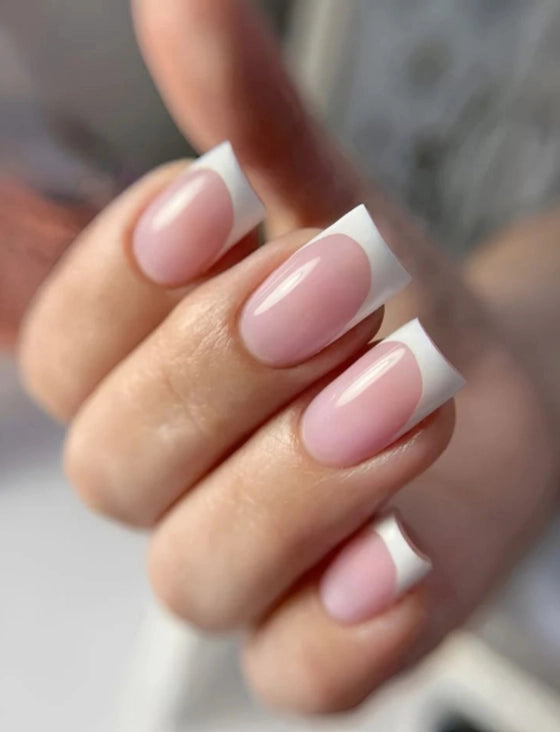 Silcare Base One HEMA Free Builder Gel French White Opal creating a classic French manicure with soft pink nail beds and crisp white tips on square nails, professional UV LED builder gel for salons and home use in Australia.