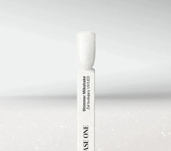 Silcare Base One Shimmer Milkshake builder gel colour swatch stick displaying a milky white shimmer shade with ultra-fine reflective sparkle, showcasing the self-levelling UV/LED builder gel finish for elegant natural-looking nails – Silcare Australia.