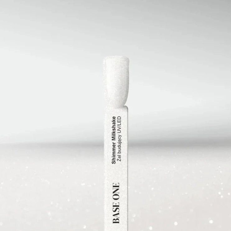 Silcare Base One Shimmer Milkshake builder gel colour swatch stick displaying a milky white shimmer shade with ultra-fine reflective sparkle, showcasing the self-levelling UV/LED builder gel finish for elegant natural-looking nails – Silcare Australia.