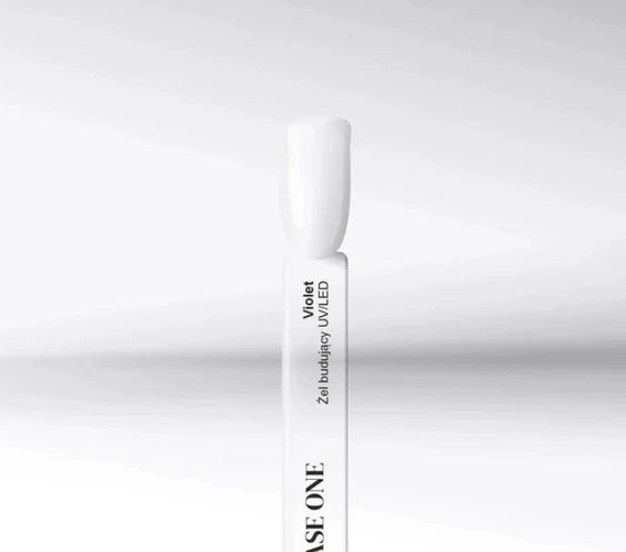Silcare Base One Violet builder UV LED gel sample stick with clear glossy nail swatch showing transparent finish on white display tip with product label
