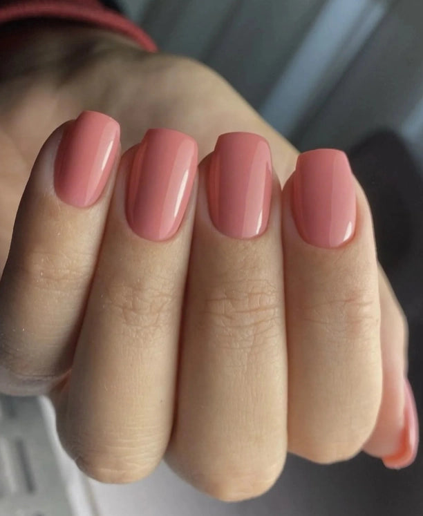 Close-up of square-shaped nails finished with Silcare Brush One Nothing Special BIAB Builder Gel in a dusty nude pink shade. Glossy natural-looking manicure with a smooth self-levelling finish, ideal for natural nail strengthening, overlays, everyday wear and long-lasting professional salon-quality results.