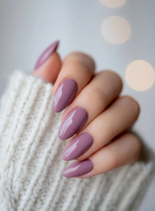 Elegant almond-shaped nails finished with Silcare Brush One Urban Storm BIAB Builder Gel in a muted lilac-grey mauve shade. Glossy self-levelling finish with a sophisticated cool-toned nude colour, ideal for natural nail strengthening, overlays and modern everyday manicures.