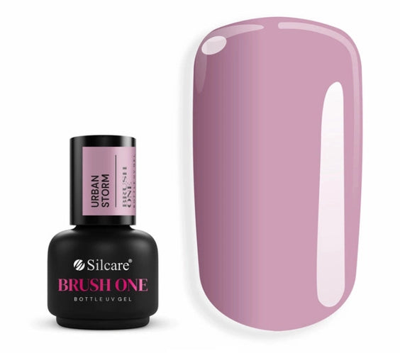 Silcare Brush One Urban Storm BIAB Builder Gel bottle displayed beside a glossy nail colour swatch in a sophisticated muted lilac-grey shade. Professional self-levelling builder gel with a cool-toned mauve finish, ideal for natural nail strengthening, overlays and elegant modern manicures.