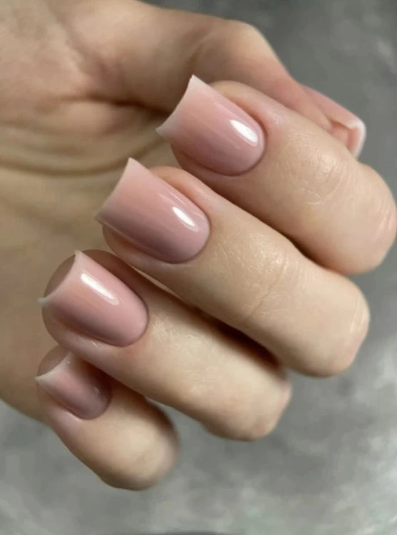 Close-up of short square nails finished with Silcare High Light LED Cover UV/LED builder gel, showcasing a soft dusty pink cover shade with a smooth self-levelling application and high-gloss salon-quality finish. Ideal for natural nail overlays, strengthening and elegant everyday manicures – Silcare Australia.