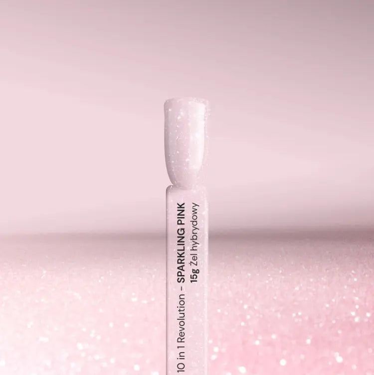 Silcare Hybrid Base 10in1 Revolution Sparkling Pink 15g hybrid gel with fine glitter particles and a soft pink finish