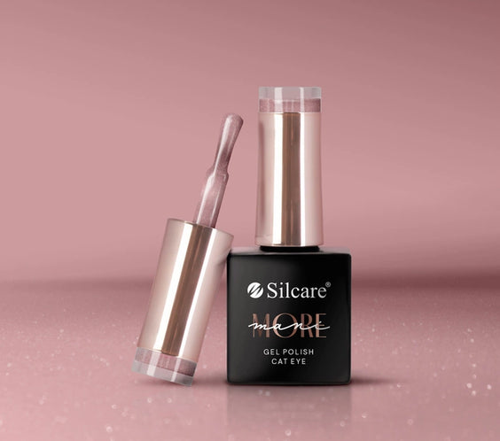 Silcare maniMORE Cat Eye Gel Polish in Pink Crush; a shimmering rose-pink magnetic gel nail polish bottle with an open applicator brush displaying a metallic velvet finish against a soft pink background.
