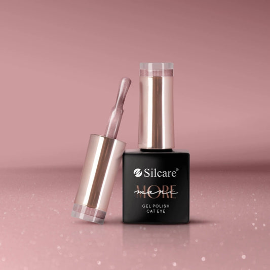 Silcare maniMORE Cat Eye Gel Polish in Pink Crush; a shimmering rose-pink magnetic gel nail polish bottle with an open applicator brush displaying a metallic velvet finish against a soft pink background.