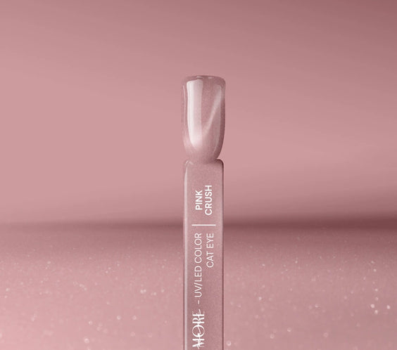 Pink Crush Cat Eye gel nail polish swatch by Silcare maniMORE; showing the UV/LED magnetic metallic glow and velvet finish on a long nail tip.