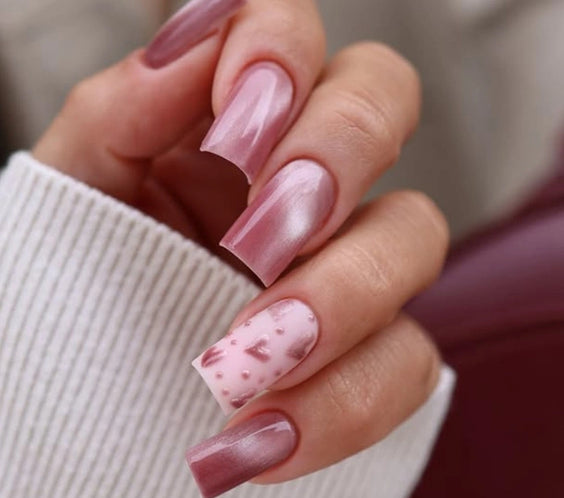 A professional manicure using Silcare maniMORE Pink Crush Cat Eye gel polish on square nails, including a matte accent nail with 3D pink magnetic heart nail art.