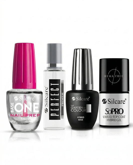 Four professional Silcare nail care products arranged in a row: Base One Nail Prep, Perfect Primer, The Garden of Colour Hybrid Base, and SoPRO HEMA Free UV/LED Top Coat Hybrid Gel. High-quality salon manicure essentials on a white reflective background.