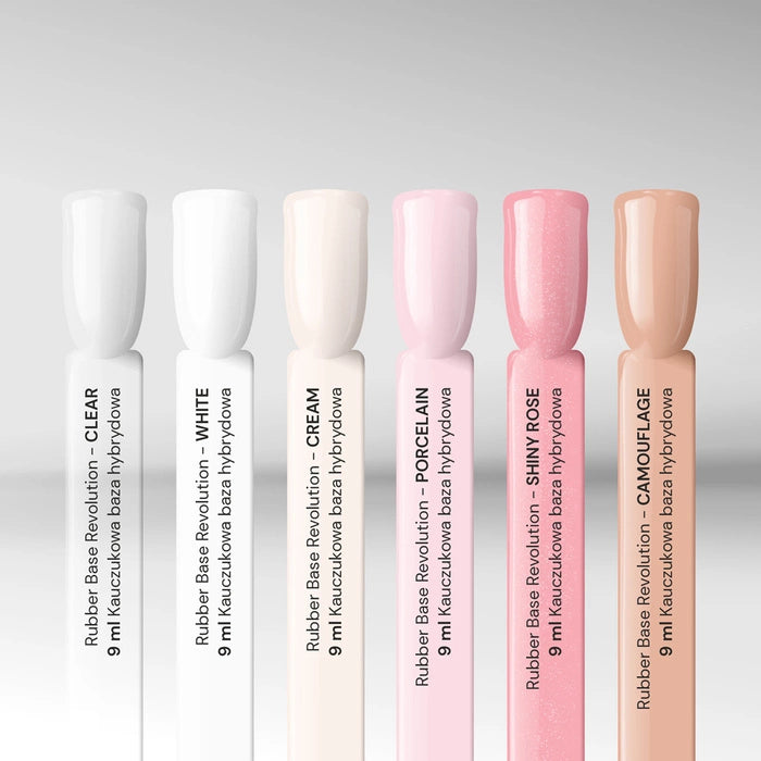 Professional Silcare Rubber Base Revolution 9ml nail swatch sticks collection featuring Clear, White, Cream, Porcelain, Shiny Rose, and Camouflage shades with a glossy salon-quality finish.