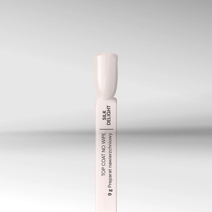 Silcare Silk Delight milky no wipe top coat nail swatch semi transparent gel top coat for baby boomer and French ombre nails.