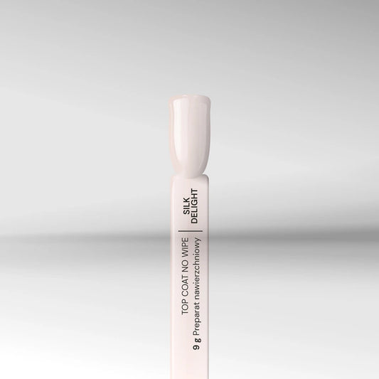 Silcare Silk Delight milky no wipe top coat nail swatch semi transparent gel top coat for baby boomer and French ombre nails.