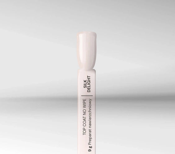 Silcare Silk Delight milky no wipe top coat nail swatch semi transparent gel top coat for baby boomer and French ombre nails.