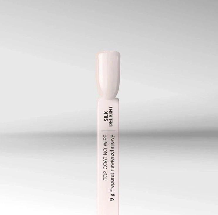 Silcare Silk Delight milky no wipe top coat nail swatch semi transparent gel top coat for baby boomer and French ombre nails.